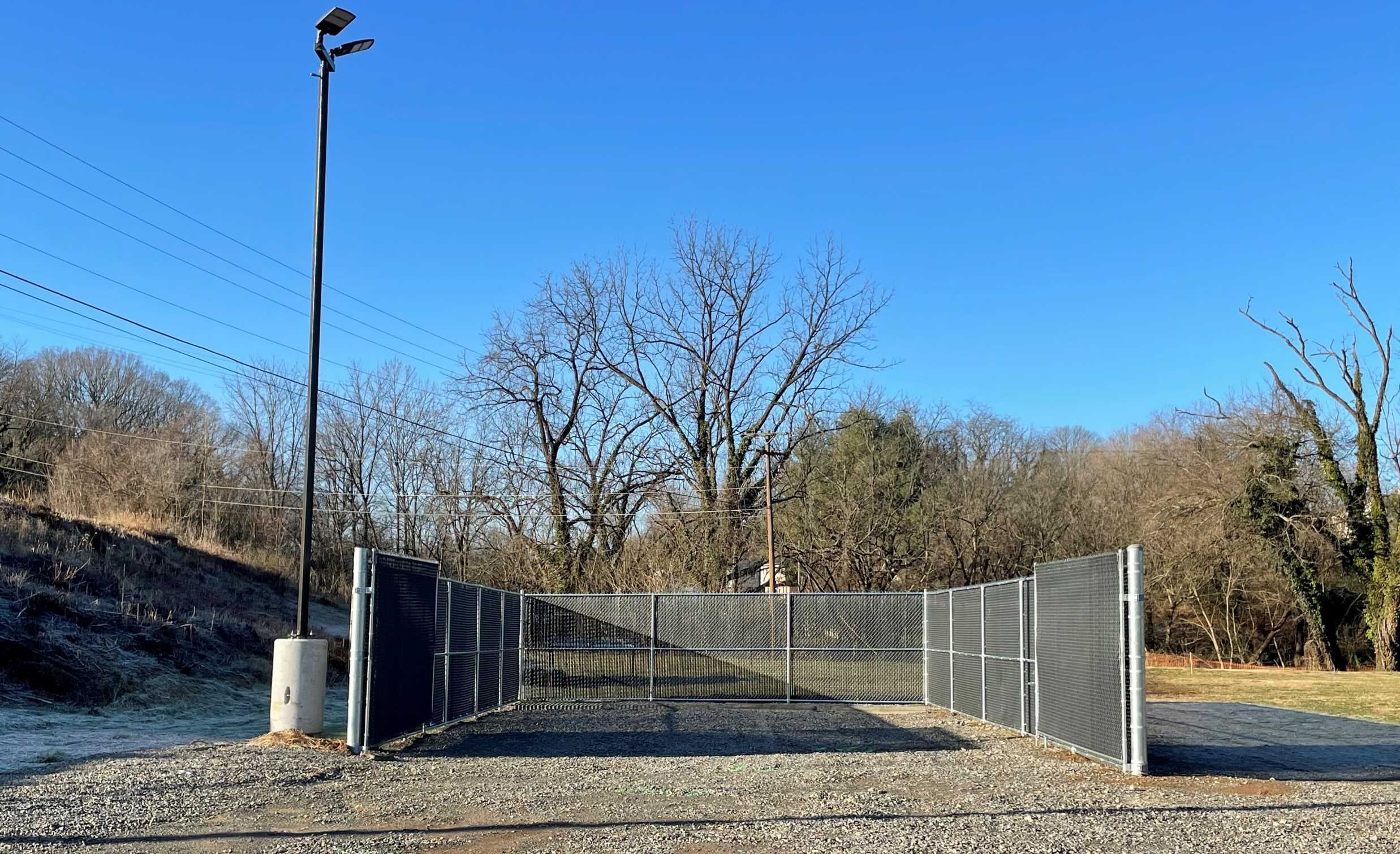 Recycling Site Fenced Area with Light Pole at Glade Creek Park